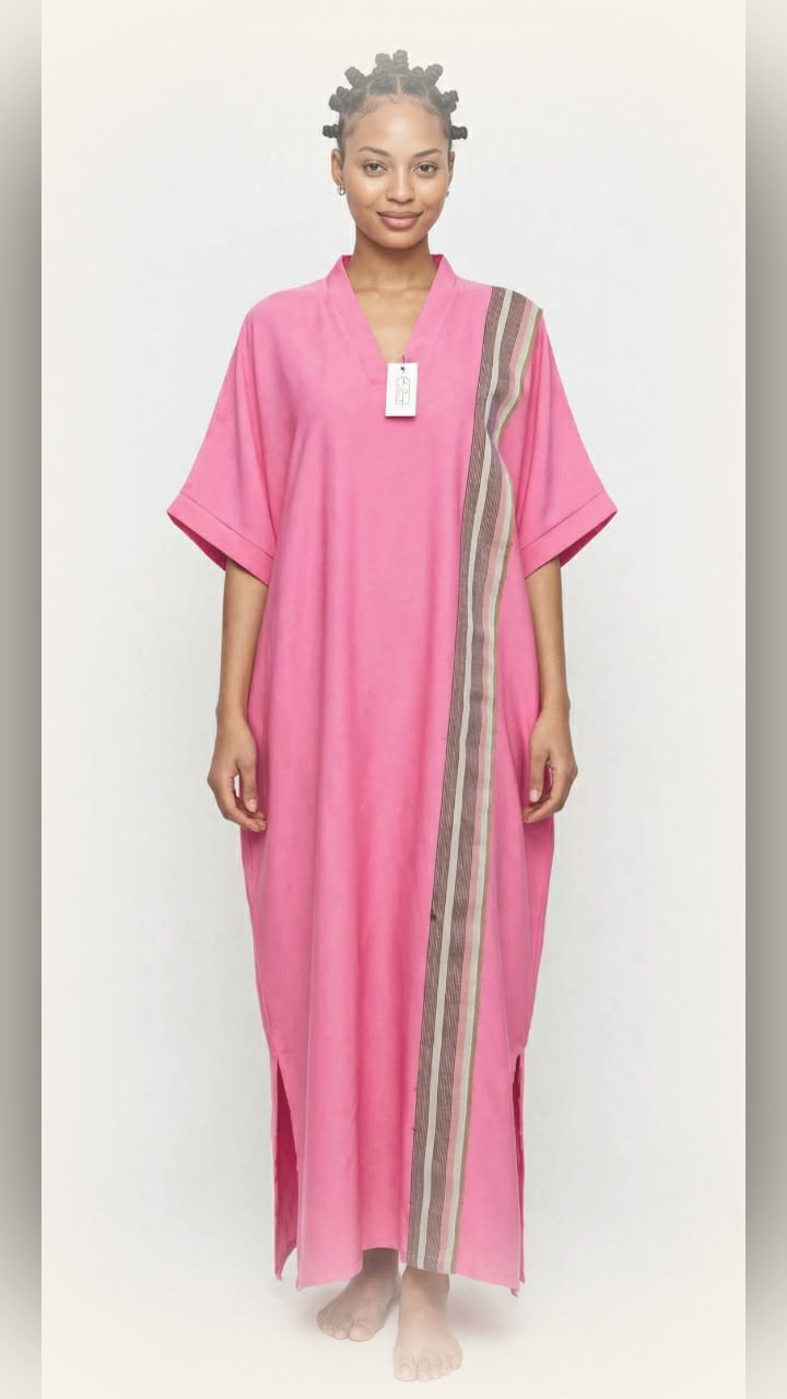 Model wearing the LJ pink striped kaftan maxi dress with vertical multi-colour stripe panel